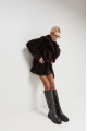 Curly double-sided chocolate-colored sheepskin coat made of natural sheepskin